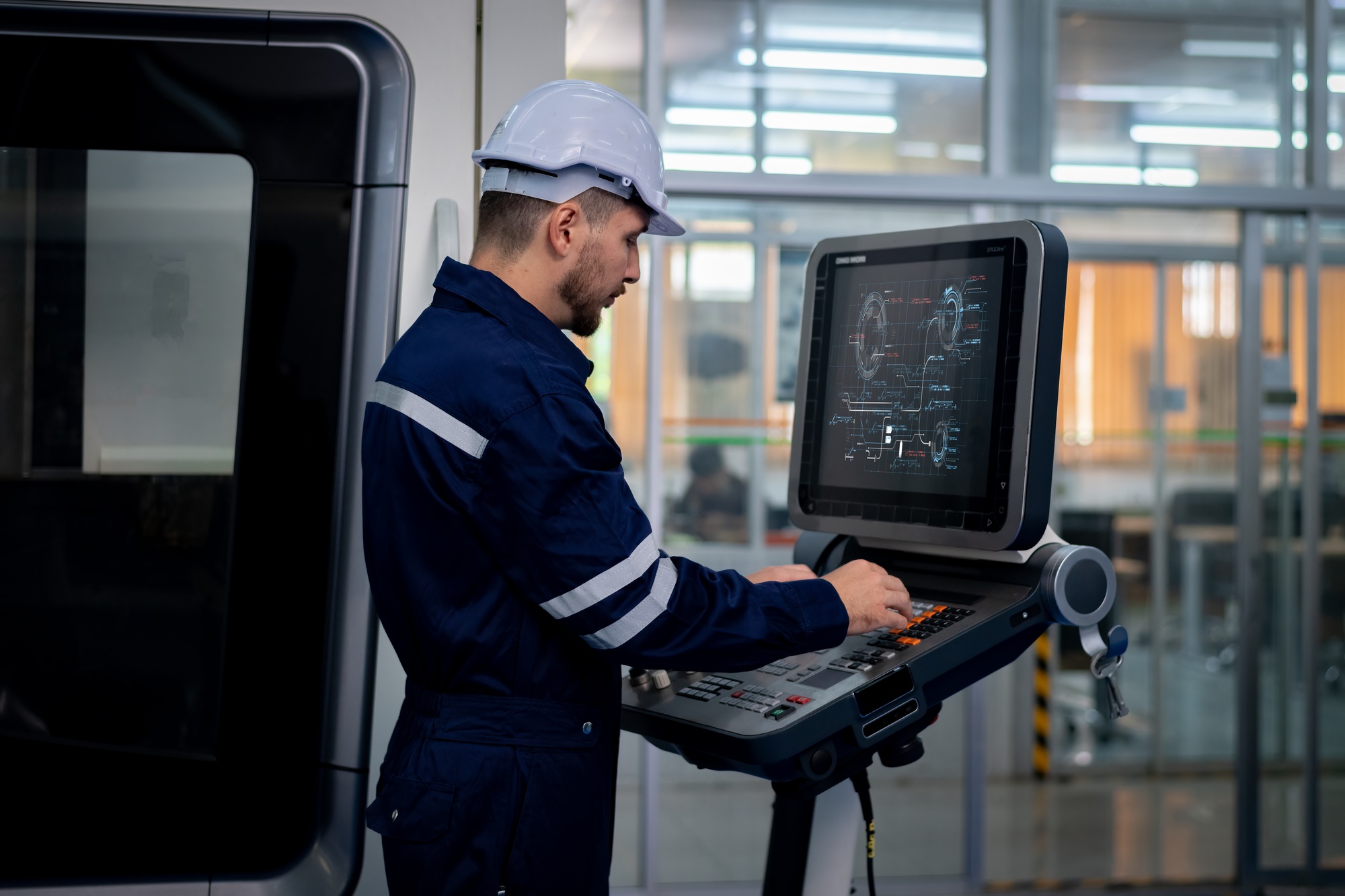 Engineer technician under control digital factory production technology showing automation manufactu